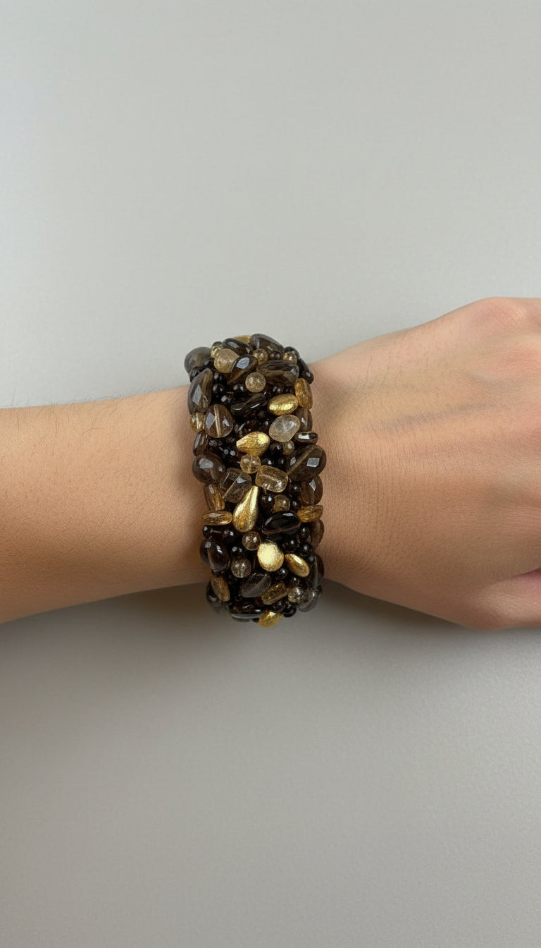 Bracelet with Brown Smoky Quartz, Citrine, Golden nuggets, and a mother of Pearl clasp.