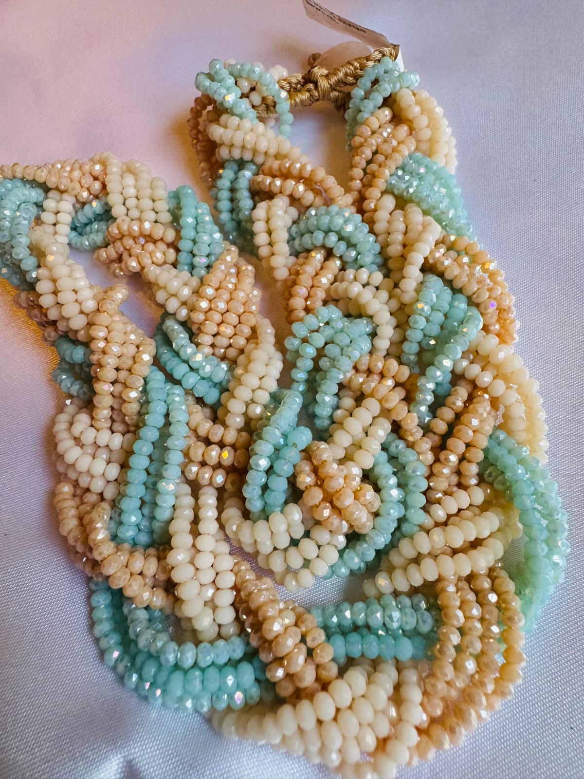 Braided necklace with crystals and Swarovski crystals.