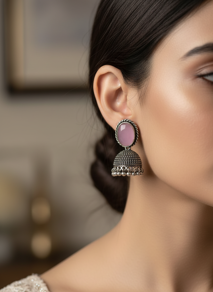 Silver plated Light pink dome jhumka metallic earrings
