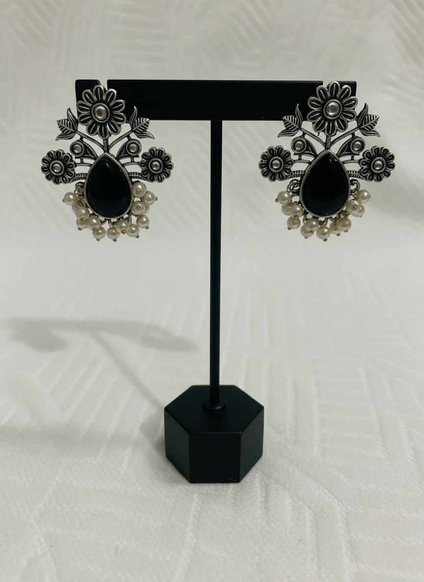 Oxidised german silver stud Black centeral stone with pearls Border Earings