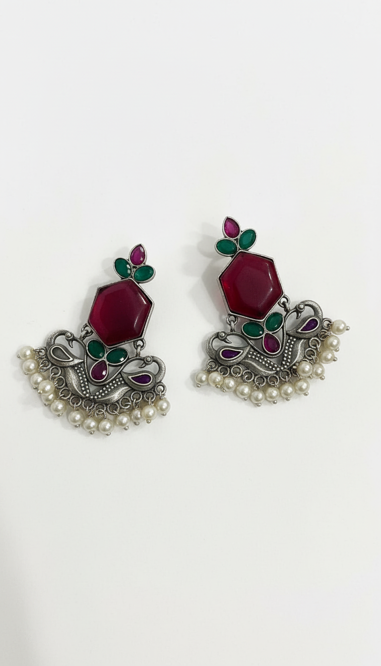 Silver plated traditional drop with red stone and pearls border earrings